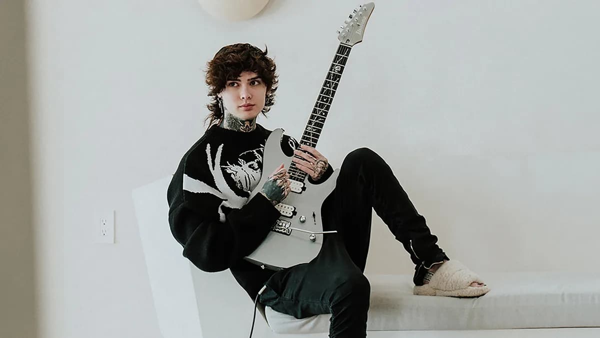 Tim Henson with his guitar